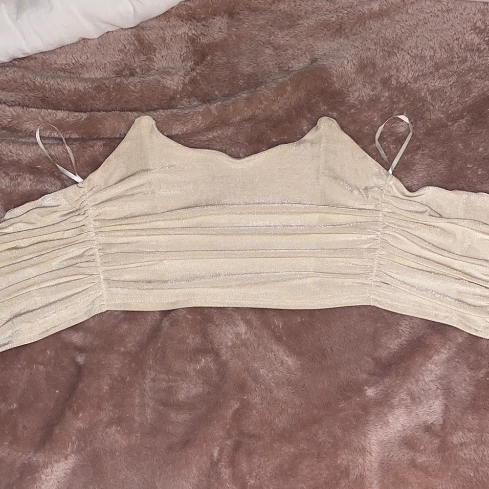 Beige corset top.